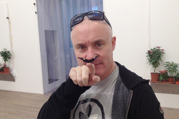 Damien Hirst with butterfly