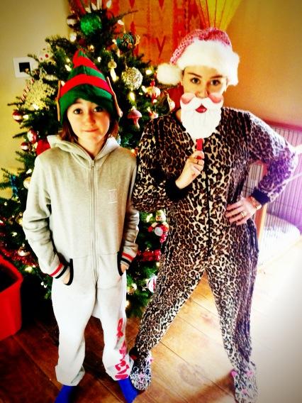 Miley Cyrus and her sister.dec.2012