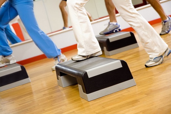 health club: group of people doing aerobics